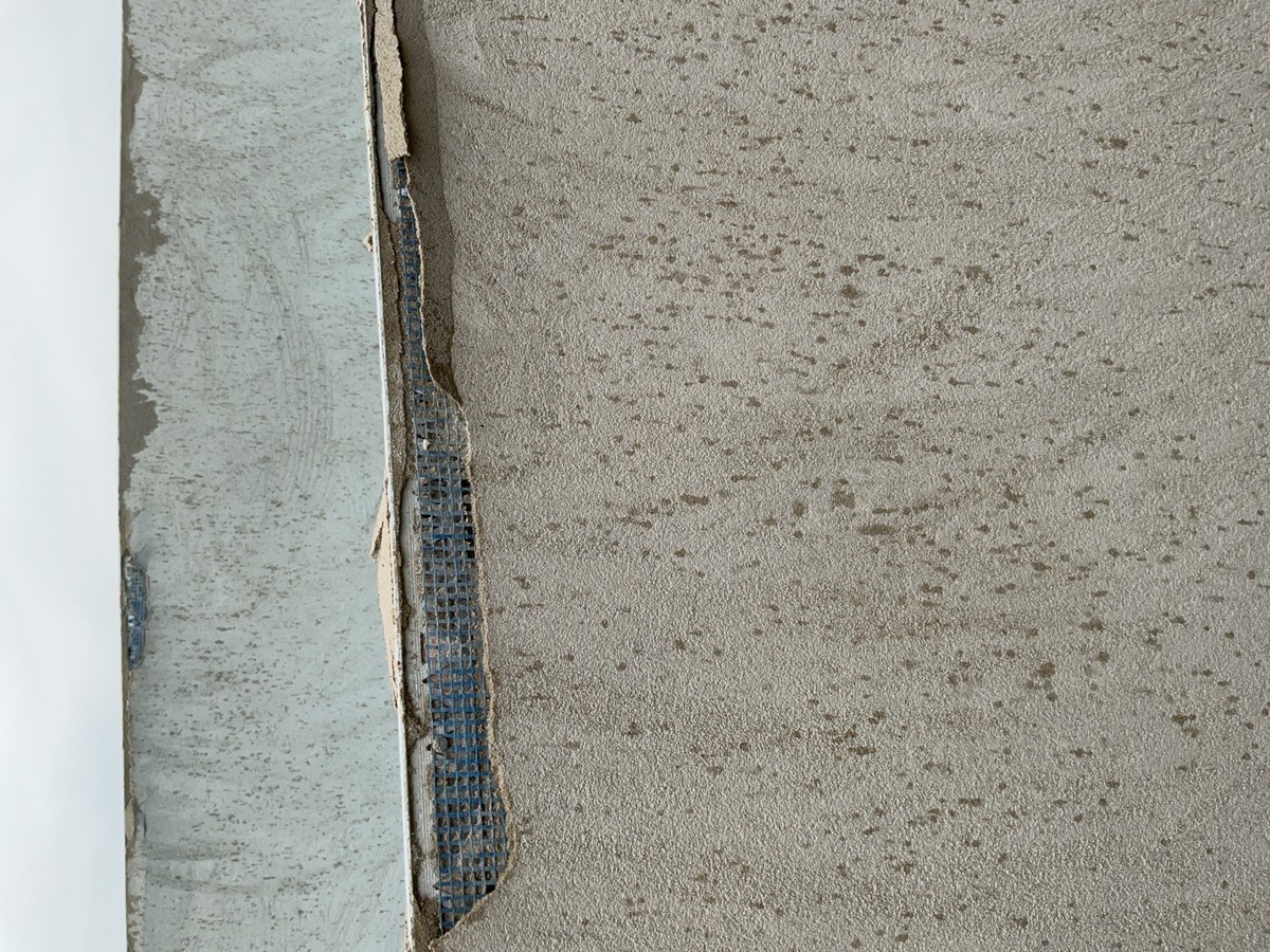 Render damaged or defective, recorded during a lock-up inspection in Austral