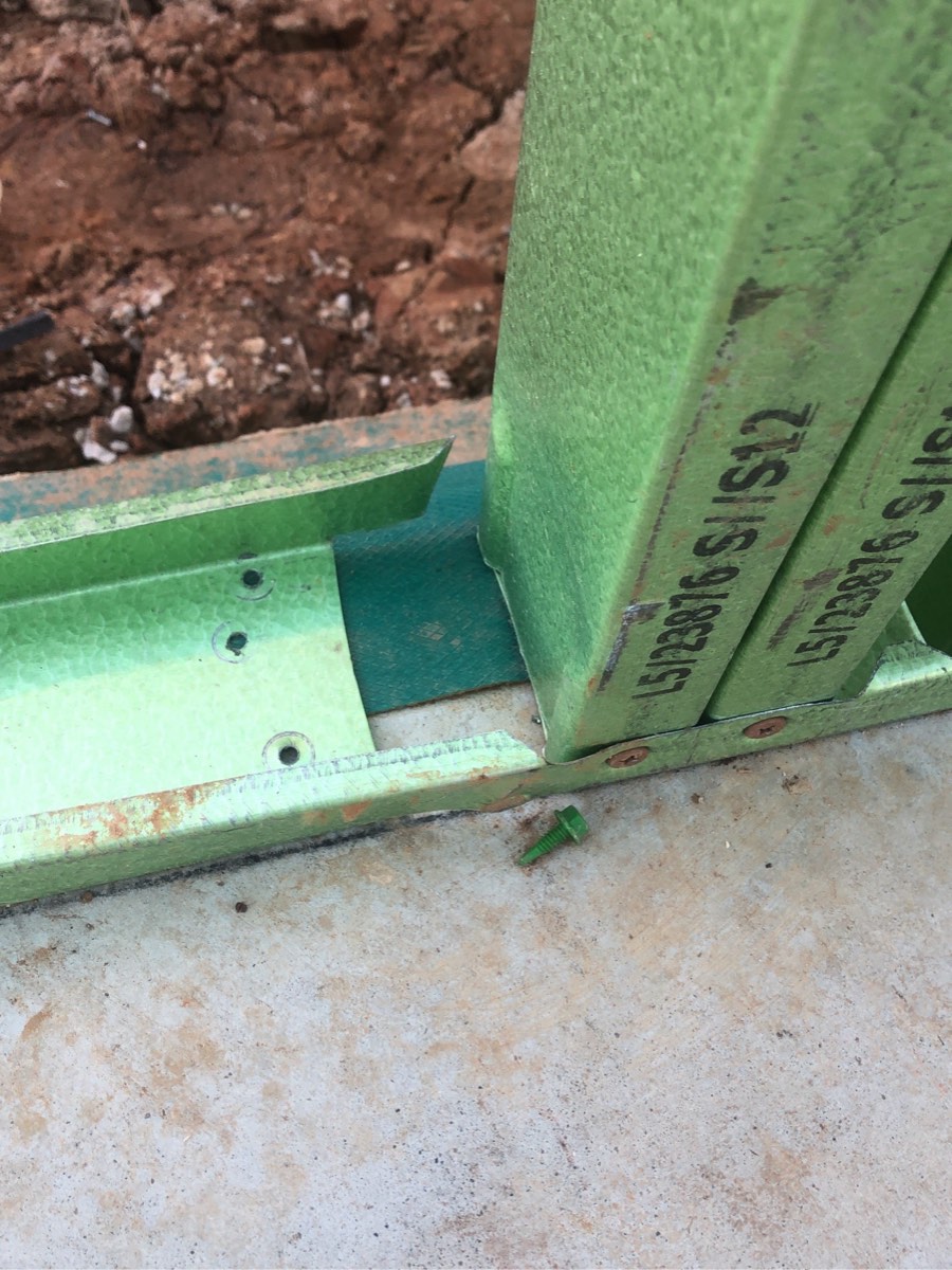 The bottom plate that stopped under a bracing wall